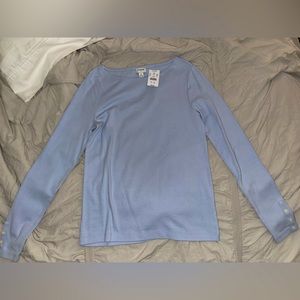 Baby blue long sleeve top.